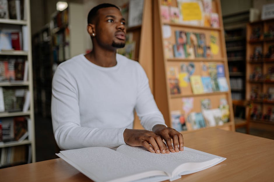 Illustration of a person reading legal documents representing the understanding of first-time offenses for someone visually impaired.